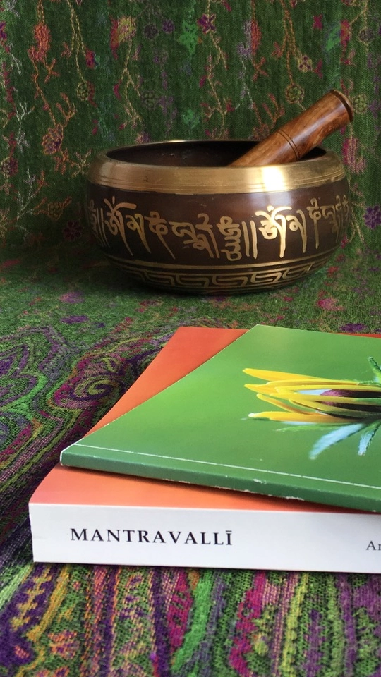 Chanting book and meditation bell